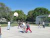 Mr. Kelly playing basketball with the students during earned AT!